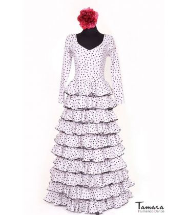 trajes de flamenca 2022 mujer - Aires de Feria - Traje de flamenca blanco lunares negros