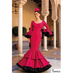 Trajes de Flamenca Aires de Feria modelo Traje de flamenca Mirada Fuxia lunares negros 