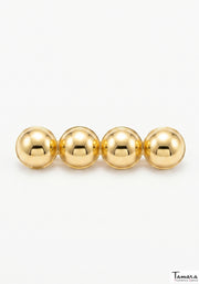 Broche dorado bolas artesano